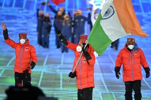 Arif Khan, the lone Indian athlete, carries the tricolor at the Winter Olympics opening ceremony.