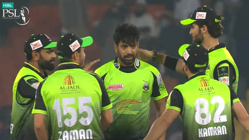 Haris Rauf, a Pakistan pacer, slaps a teammate on the field during a PSL match before hugging him later.